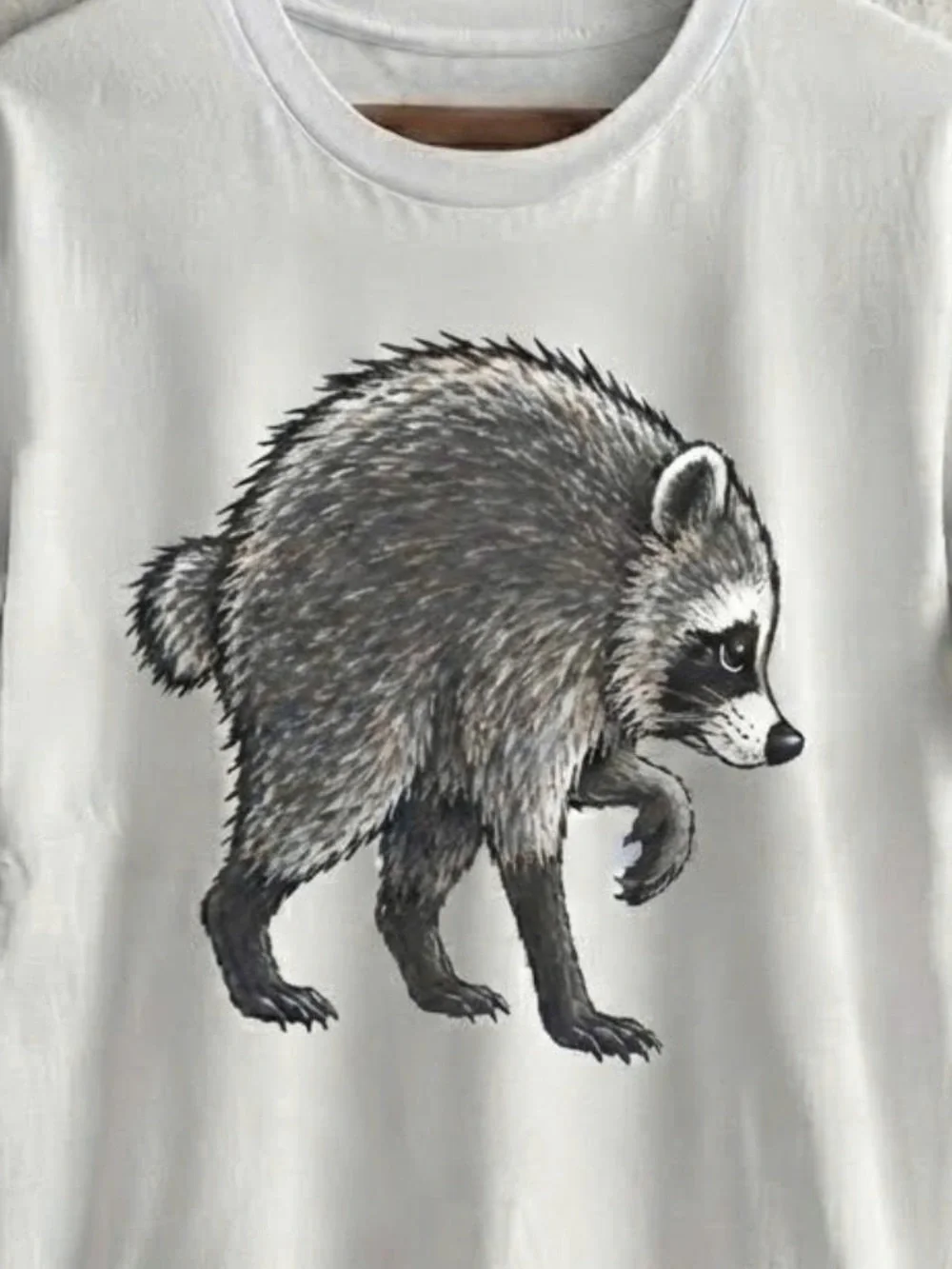 White Shirt with Jimothy Raccoon Graphic Tee